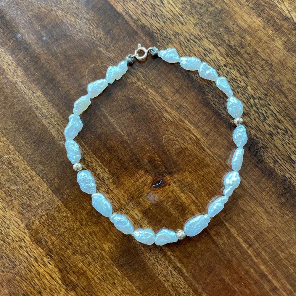 Pearl bracelet with 14K gold clasp and gold tone beads